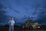 com.newscom.model.mediaobject.impl.MSMediaObject@2ed9e5e3[tagId=depphotos265463,docId=34553379HighRes,ftSubject=Young man with his vintage truck watching gathering storm clouds,rfrm=<null>]