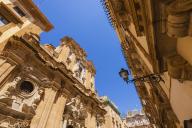 com.newscom.model.mediaobject.impl.MSMediaObject@64078209[tagId=depphotos265555,docId=34554738HighRes,ftSubject=Looking up at the ornate stone buildings in the historic, Old Town of Trapani, Sicily, Italy,rfrm=<null>]
