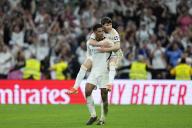 Fran Garcia of Real Madrid and Jude Bellingham of Real Madrid celebrate victory at the en of La Liga match between Real Madrid and FC Barcelona played at Santiago Bernabeu Stadium on April 21 2024 in Madrid, Spain. (Photo by Cesar Cebolla / ALFAQUI