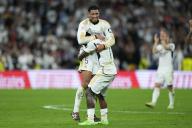 Vinicius Jr and Jude Bellingham of Real Madrid celebrate victory at full time of the La Liga match between Real Madrid and FC Barcelona played at Santiago Bernabeu Stadium on April 21 2024 in Madrid, Spain. (Photo by Cesar Cebolla / ALFAQUI