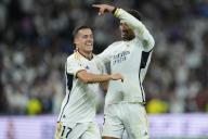 Jude Bellingham and Lucas Vazquez of Real Madrid celebrate at full time of the La Liga match between Real Madrid and FC Barcelona played at Santiago Bernabeu Stadium on April 21 2024 in Madrid, Spain. (Photo by Cesar Cebolla / ALFAQUI