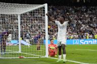 Vinicius Jr of Real Madrid celebrate at full time of the La Liga match between Real Madrid and FC Barcelona played at Santiago Bernabeu Stadium on April 21 2024 in Madrid, Spain. (Photo by Cesar Cebolla / ALFAQUI