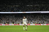 Jude Bellingham of Real Madrid celebrates victory at full time of the La Liga match between Real Madrid and FC Barcelona played at Santiago Bernabeu Stadium on April 21 2024 in Madrid, Spain. (Photo by Cesar Cebolla / ALFAQUI