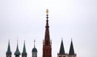 29 March 2024, Bavaria, Würzburg: The towers of the cathedral, the Neumünster church and the Marienkapelle chapel stand out against the cloudy sky. Photo: Karl-Josef Hildenbrand\/dpa