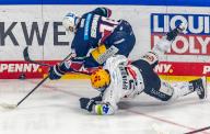 19 April 2024, Berlin: Ice hockey: DEL, Eisbären Berlin - Pinguins Bremerhaven, championship round, final, matchday 2, Uber Arena. Berlin\'s Lean Bergmann (l) fights for the puck against Nicolas Appendino of Pinguins Bremerhaven. Photo: Andreas Gora\/dpa