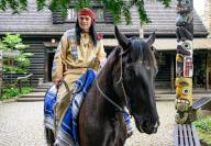 24 April 2024, Saxony, Radebeul: The actor from the Landesbühnen Sachsen Michael Berndt-Cananá as Winnetou rides along the grounds of the Karl May Museum as part of a press event for the Karl May Festival. This year\'s 31st Karl May Festival will take place from May 10 to May 12, 2024. Photo: Robert Michael\/dpa