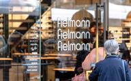 PRODUCTION - 29 April 2024, Hamburg: The lettering "fielmann" stands at the entrance to the flagship store in Hamburg\'s city center. Photo: Markus Scholz\/dpa