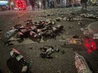 01 May 2024, Berlin: Empty bottles and broken glass litter Oranienstraße around midnight after the parties and demonstrations on May 1. Photo: Andreas Rabenstein\/dpa