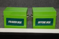 04 May 2024, Berlin: Ballot boxes labeled "Women\'s Box" and "Open Box" are available at the Bündnis90\/Die Grünen party conference (state delegates\' conference) at the Estrel Convention Center. The main topic is a more consistent approach against right-wing extremist ideas. Photo: Joerg Carstensen\/dpa