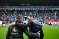 04 May 2023, Mecklenburg-Western Pomerania, Rostock: Soccer: Bundesliga 2, Hansa Rostock - Karlsruher SC, Matchday 32, Ostseestadion. Rostock coach Mersad Selimbegovic (l-r) and Karlsruhe coach Christian Eichner greet each other before the game. Photo: Gregor Fischer\/dpa - IMPORTANT NOTE: In accordance with the regulations of the DFL German Football League and the DFB German Football Association, it is prohibited to utilize or have utilized photographs taken in the stadium and\/or of the match in the form of sequential images and\/or video-like photo series