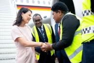 05 May 2024, Fiji, Nadi: Annalena Baerbock (Alliance 90\/The Greens), German Foreign Minister, is welcomed at the airport. Foreign Minister Baerbock\'s week-long trip to Australia, New Zealand and Fiji will focus on security policy and climate protection. Photo: Sina Schuldt\/dpa