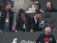05 May 2024, Hesse, Frankfurt\/Main: Soccer: Bundesliga, Eintracht Frankfurt - Bayer 04 Leverkusen, Matchday 32, Deutsche Bank Park. Leverkusen head coach Xabi Alonso (center right) walks to his seat in the press stands. Photo: Arne Dedert\/dpa - IMPORTANT NOTE: In accordance with the regulations of the DFL German Football League and the DFB German Football Association, it is prohibited to utilize or have utilized photographs taken in the stadium and\/or of the match in the form of sequential images and\/or video-like photo series