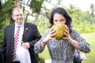 06 May 2024, Fiji, Vuniniudrovo: Annalena Baerbock (Alliance 90\/The Greens), German Foreign Minister, visits the village of Vuniniudrovo, which has been affected by flooding and land erosion due to the climate crisis, and drinks from a coconut. Foreign Minister Baerbock\'s week-long trip to Australia, New Zealand and Fiji will focus on security policy and climate protection. Photo: Sina Schuldt\/dpa