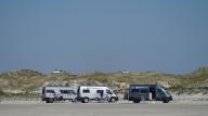 02 May 2024, Schleswig-Holstein, St. Peter-Ording: Motorhomes are parked on the sandy beach of the beach parking lot in St. Peter-Ording. Photo: Marcus Brandt\/dpa