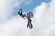 SYMBOL - 09 May 2024, Baden-Württemberg, Friedrichshafen: Luc Ackermann in action at an FMX show at the Tuning World Bodensee. Photo: Silas Stein/dpa