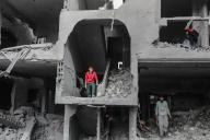 11 May 2024, Palestinian Territories, Deir al-Balah: Palestinians inspect damages following an Israeli air strike on Al Maghazi refugee camp, in the central Gaza Strip. Photo: Omar Naaman/dpa