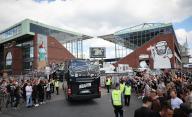 12 May 2024, Hamburg: Soccer: Bundesliga 2, matchday 33, FC St. Pauli - VfL Osnabrück, at the Millerntor Stadium. The St. Pauli team bus arrives at the stadium. Photo: Christian Charisius/dpa - IMPORTANT NOTE: In accordance with the regulations of the DFL German Football League and the DFB German Football Association, it is prohibited to utilize or have utilized photographs taken in the stadium and/or of the match in the form of sequential images and/or video-like photo series