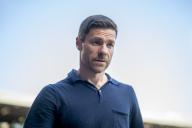 12 May 2024, North Rhine-Westphalia, Bochum: Soccer: Bundesliga, VfL Bochum - Bayer Leverkusen, Matchday 33, Vonovia Ruhrstadion: Leverkusen coach Xabi Alonso enters the stadium. Photo: David Inderlied/dpa - IMPORTANT NOTE: In accordance with the regulations of the DFL German Football League and the DFB German Football Association, it is prohibited to utilize or have utilized photographs taken in the stadium and/or of the match in the form of sequential images and/or video-like photo series