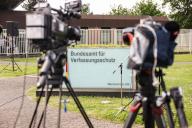 13 May 2024, North Rhine-Westphalia, Cologne: TV cameras stand in front of the Federal Office for the Protection of the Constitution (BfV). Photo: Oliver Berg/dpa