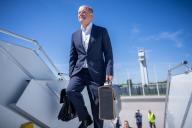 13 May 2024, Brandenburg, Schönefeld: Federal Chancellor Olaf Scholz (SPD) boards a plane to fly to Sweden. Scholz takes part in the Nordic Council meeting. Photo: Michael Kappeler/dpa