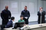 15 May 2024, Schleswig-Holstein, Itzehoe: The defendant Ibrahim A. (M) sits in the courtroom at the China Logistic Center next to an interpreter (l) and his lawyer Björn Seelbach (r). In the trial for a fatal knife attack in northern Germany, the Itzehoe district court sentenced the defendant Ibrahim A. to life imprisonment for murder and attempted murder on Wednesday. Photo: Christian Charisius/dpa/Pool/dpa - ATTENTION: Defendant pixelated on the instructions of the court