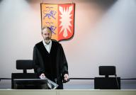 15 May 2024, Schleswig-Holstein, Itzehoe: Johann Christoph Lohmann, presiding judge at the regional court, enters the courtroom at the China Logistic Center. In the trial for a fatal knife attack in northern Germany, the Itzehoe district court sentenced the defendant Ibrahim A. to life imprisonment for murder and attempted murder on Wednesday. Photo: Christian Charisius/dpa/Pool/dpa