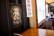 15 May 2024, Berlin: A jersey of German international Antonio Rüdiger with a personal dedication hangs in the kebab restaurant "Hisar Fresh Food" in the Kreuzberg district. After Rüdiger was nominated for the European Championship, the owner of the player