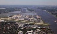 14 May 2024, Hamburg: View over the Airbus plant in Finkenwerder with runway on the Elbe (aerial view). Photo: Christian Charisius/dpa