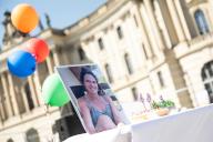 16 May 2024, Berlin: View of a picture of Carmel, a kidnapped person whose birthday is today. Bebelplatz is to become the symbolic "Square of the Hamas Hostages" for a few weeks. There were also 132 empty chairs. Photo: Hannes P. Albert/dpa
