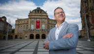 16 May 2024, Saxony, Chemnitz: Christoph Dittrich, General Director of Chemnitz Municipal Theatres, stands in front of the opera. Despite its financially strained situation, the Chemnitz Theatre believes it is well prepared for the Capital of Culture year 2025. Photo: Jan Woitas\/dpa