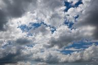 16 May 2024, Hesse, Frankfurt/Main: Clouds drift across the blue sky over Frankfurt am Main. Photo: Arne Dedert/dpa