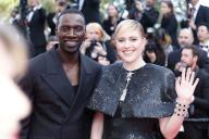 Omar Sy and Greta Gerwig attend the red carpet premiere of 