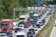 17 May 2024, Hamburg: Slow-moving to gridlocked traffic can be seen on the A1 near the HH-Südost junction. Many travelers are stuck in heavy traffic on the freeways at the start of the Whitsun vacations. Photo: Bodo Marks/dpa
