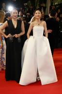 Liang Jing and Tong Liya attend the premiere of \'Oh Canada\' during the 77th Cannes Film Festival at Palais des Festivals in Cannes, France, on 17 May 2024