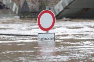 18 May 2024, Rhineland-Palatinate, Cochem: A flood warning sign is almost covered by the Moselle. Heavy continuous rain has caused rivers to burst their banks and cause flooding. Photo: David Young\/dpa