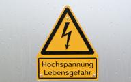 PRODUCTION - 17 May 2024, Baden-Württemberg, Straubenhardt: A sign reading "High voltage danger to life" is attached to an intelligent transformer station operated by Netze BW. Photo: Uli Deck\/dpa
