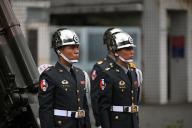 19 May 2024, Taiwan, Taipeh: Taiwanese army soldiers stand in a group during a rehearsal. Taiwan