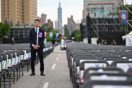 20 May 2024, Taiwan, Taipeh: A security guard stands between rows of chairs. Taiwan