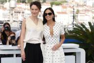 Coralie Fargeat and Demi Moore pose at the photo call of 