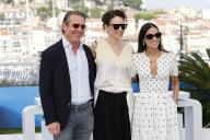 Dennis Quaid, Coralie Fargeat and Demi Moore pose at the photo call of 