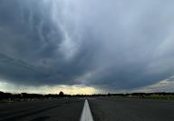 20 May 2024, Berlin: Dark clouds gather over Tempelhofer Feld. Photo: Monika Skolimowska/dpa