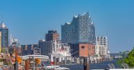 16 May 2024, Hamburg: View from west to east across the Elbe to the Elbphilharmonie concert hall in Hamburg\