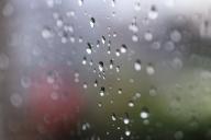21 May 2024, Saxony, Dresden: A window pane is wet with raindrops. Photo: Robert Michael/dpa