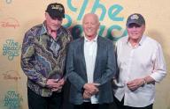 13 May 2024, Great Britain, London: The Beach Boys Mike Love (l) and Bruce Johnston (r) stand next to director Frank Marshall (M) in the Abbey Road Studios. The artists present their documentary film "The Beach Boys". Photo: Philip Dethlefs/dpa