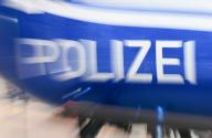 21 May 2024, Baden-Württemberg, Stuttgart: The word police is attached to a helicopter of the police helicopter squadron (wiping effect due to zooming with long exposure). Photo: Bernd Weißbrod/dpa
