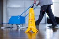 22 May 2024, North Rhine-Westphalia, Duesseldorf: A stylized banana peel indicates a possible risk of slipping during cleaning work in the Landtag. Photo: Rolf Vennenbernd/dpa