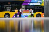 23 May 2024, Saxony, Dresden: A rainbow-colored bus from Dresdner Verkehrsbetriebe (DVB) stands on the Altmarkt during the presentation. On the occasion of this year
