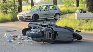 23 May 2024, Lower Saxony, Neuenkirchen: A scooter and debris lie on the road. A 46-year-old scooter rider was hit by a car in Neuenkirchen in the district of Osnabrück, causing life-threatening injuries. A 53-year-old woman had turned onto the main road in her car coming from a side road and had overlooked the scooter rider. Photo: Ulf Zurlutter/Nord-West-Media /dpa