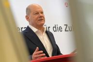 24 May 2024, Brandenburg, Potsdam: Federal Chancellor Olaf Scholz speaks at the job information center of the employment agency. In his capacity as a member of the Bundestag, Scholz visited the Potsdam Employment Agency and the Job Center to find out about the so-called Job Turbo for the integration of refugees into the labour market and the "Spurwechsel" model project of the city of Potsdam. Photo: Michael Bahlo/dpa