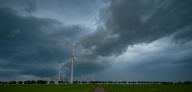 24 May 2024, Brandenburg, Sieversdorf: Dark storm clouds move across the landscape in the east of Brandenburg in the late evening. Photo: Patrick Pleul/dpa